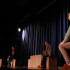 Jonathan VanHecke (12), Adam Gustas (9), Nichole Heusmann (10) and Raquel Rembert (10) listen to directions during the rehearsal for “Drum Taps.” The four were chosen as the cast for the competition show.