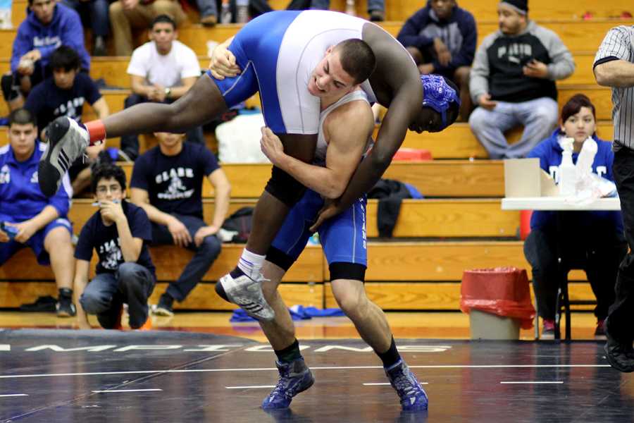 Jacob Stewart (11) prepares to slam his competitor to the mat. The Indians took second at Sectionals as a team.