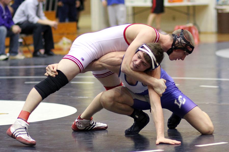 Kleimola fights to win his first Sectional title. He came out victorious in the end with a winning score of 11-2.