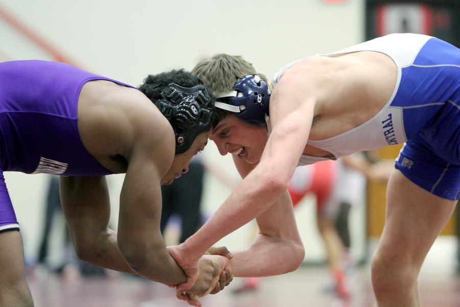 Jacob Kleimola and his competitor hand fight in the beginning of the match. This was the first time that Kleimola has wrestled in the Regional tournament.