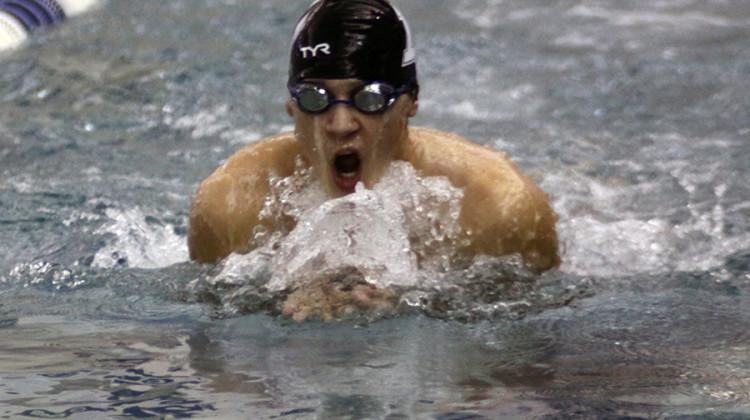 Zachary DeJoris (11) swims the 100 breaststroke. The varsity boys swim team lost 116-67 to Penn.