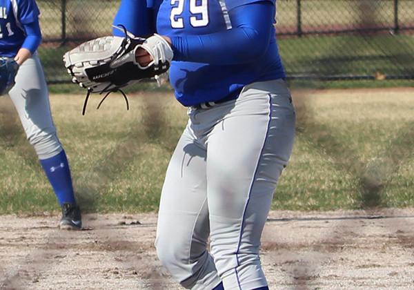 Julia Schassburger (12) pitches the ball to a Munster player. The varsity girls played Munster on March 29.
