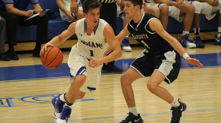 Running aside his opponent, Derek Hobbs (9) goes to score a point. He gained many points throughout the night.