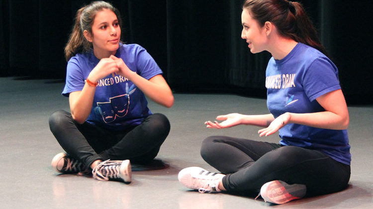 Bianca Alessia (12) tells Natalie Bivona (10) a scary story in the skit “Coworking Campers.” In this skit, they were on a camping trip in the woods.