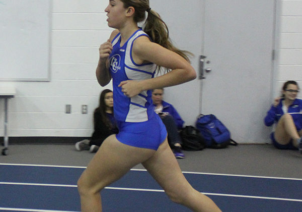 Anna Olivero (9) runs in the 800 and the 4x800 relay. Olivero got a time of 2:53 in her race.