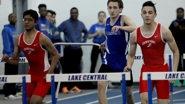 Caleb Pisowicz (11) runs in the 50-meter hurdles. Pisowicz placed fourth.