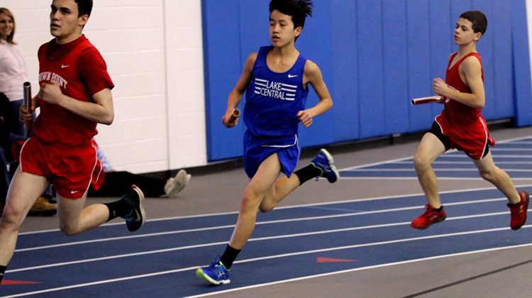 Josh Chen (9) races in the 4x800 relay. The relay team placed second.