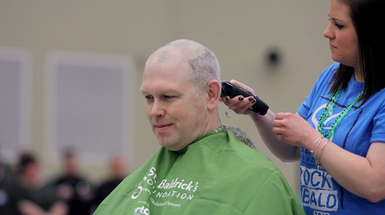 Head Principal Sean Begley gets his head shaved at the St. Baldrick’s assembly. Lake Central raised $12,139 for childhood cancer.