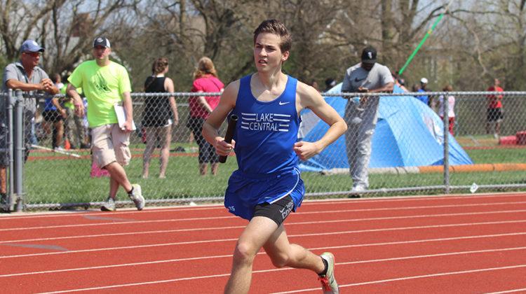 Andrew Ackerman (12) turns onto the third turn on the track. Ackerman ran the boys 4X800 meter relay.