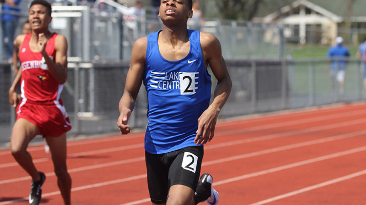 Deshaun Luis (10) sprints down the track. The wind made the meet challenging for distance runners as well as sprinters.