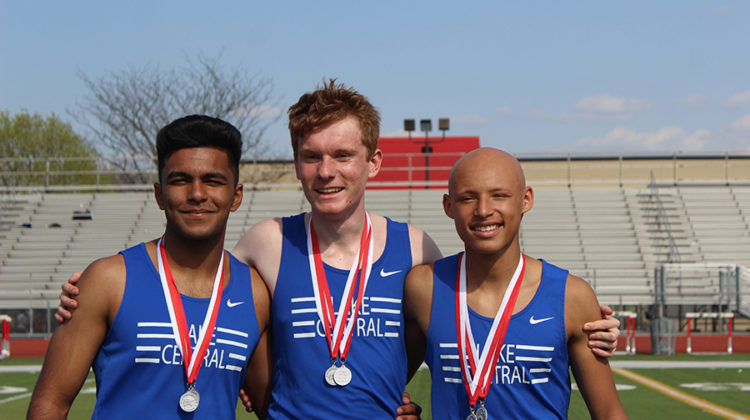 Issac Beatty (10), Carter Goldman (10) and Gurvir Gill (10) left pose for a picture after winning second place at the Dick Bebe invitational. The boys ran the freshman sophomore 4X4 and other races.