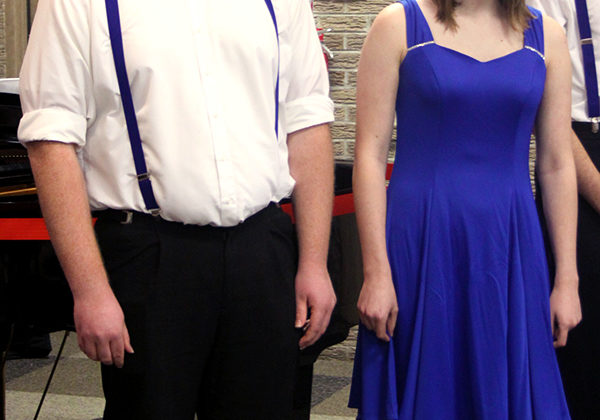 George Gundelach (11) and Olivia Froelich (12) perform with the choir at the banquet. All the members in Academic Letter Winners have to have a GPA of 3.9 or above.