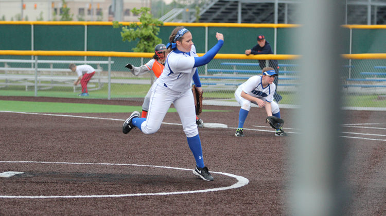 Madisen Tucker (11) pitches the softball. The girls’ next game is May 25 at 6:00 at home.