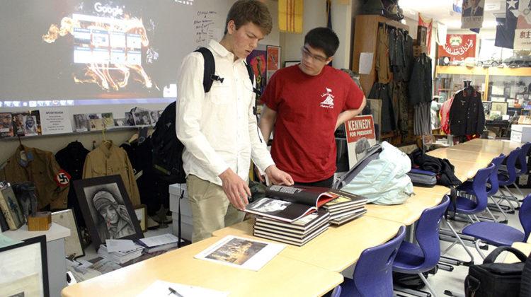 Theodore Mantis (10) and admire a few war books. The books were brought in for everyone to look at and learn about past wars.