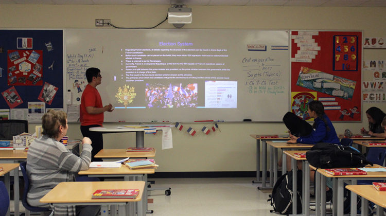 Theodore Mantis (10) gives a presentation on the French electoral system. He also gave information on each of the two candidates running to be the French president.
