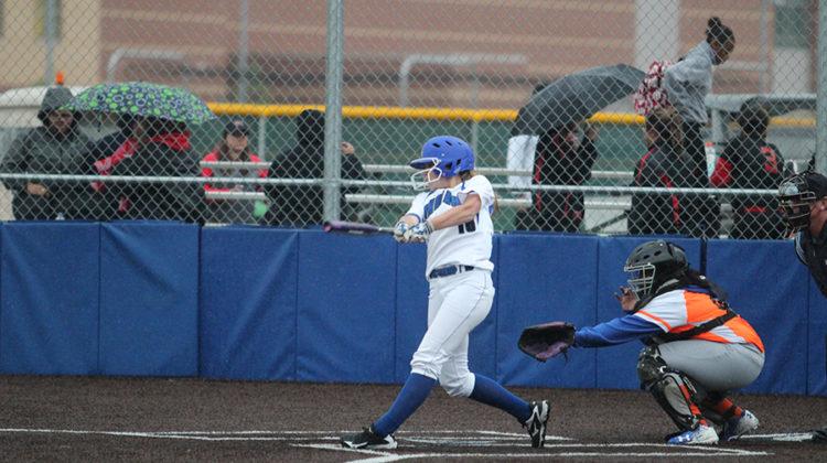 Olivia Peterson (10) swings the bat, and gets ready to run to first base. Lake Central will be advancing to the semi-finals to face Morton High School.