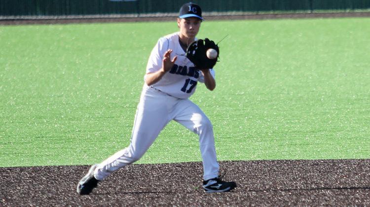 Jacob Ranola (10) concentrates and catches a hit that bounced straight to him. Ranola successfully caught the ball, threw it to first base and ended the game.