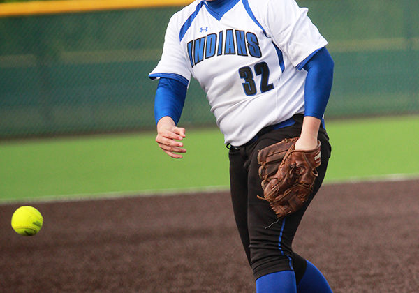 Selena Michka (11) pitches the ball for the Indians. Michka had eight strikeouts during the game.