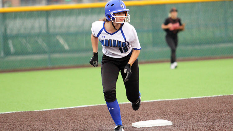 Amanda Noblett (11) pinch runs for Selena Michka (11). The Lake Central Indian’s played The Laporte Slicers.