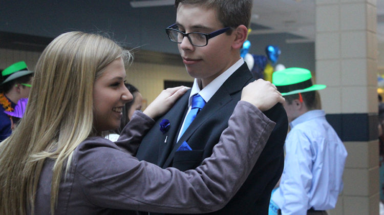 Austin Huber (12) dances with Anna Weir (11) during the slow dance. The club met at least once a month to participate in fun activities outside of school.