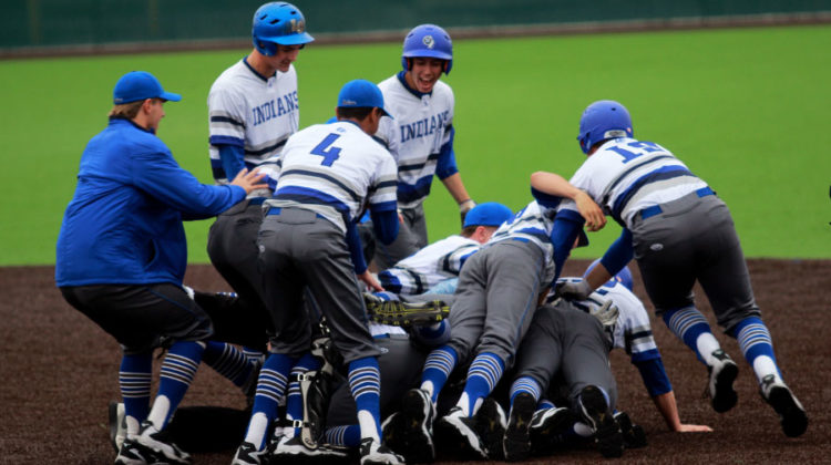 The boys celebrate their win at the end of the game. This game was held on May 9.