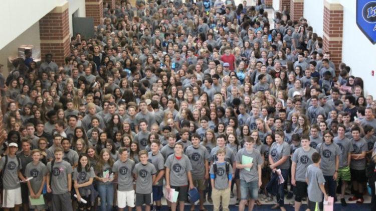 The class of 2021 pose for a large group picture. The freshman took the picture after tours concluded.