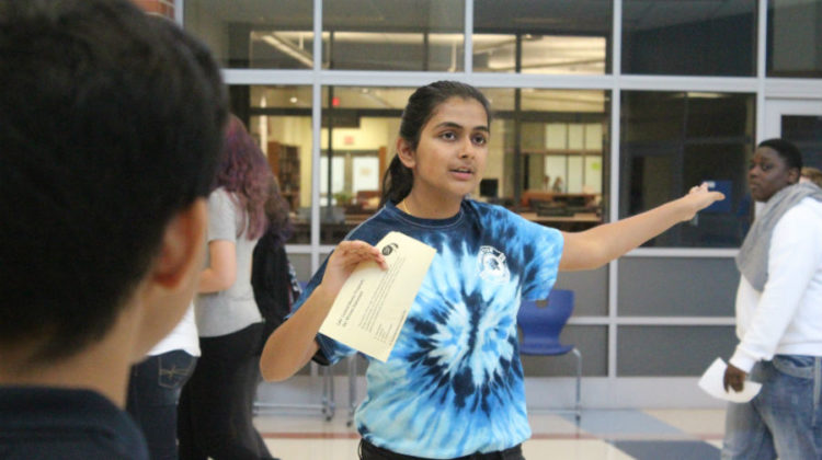 Sneha Shatish (12) gives her tour group directions. Shatish was giving tours as part of the new peer mentorship program.