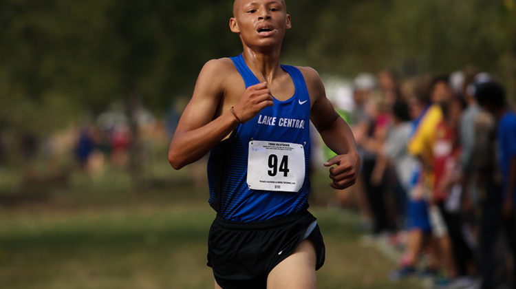Issac Beatty (11) runs down towards the finish line. Beatty placed fourth place at Sectionals. Photo by: Josh Chen