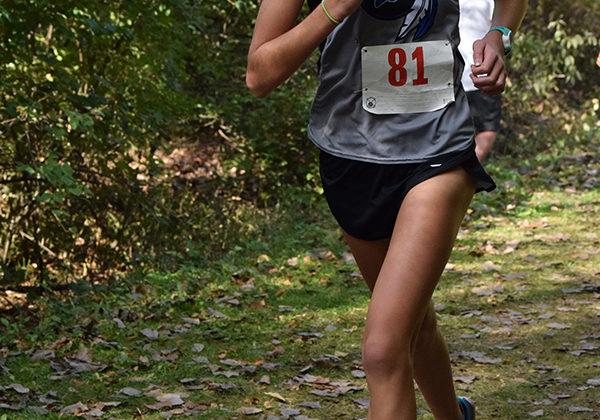 Rachel Kujawa (10) runs her second lap. Kujawa has ran with the team for two years now.