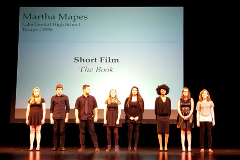 Martha Mapes (12), far right, stands with all of the thespians featured in the National Individual Event Showcase. Her short film, titled “The Book,” was named the best in the nation. Photo submitted by Mr. Ray Palasz, English.