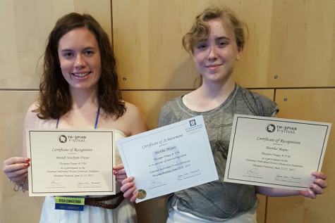 Brandilyn Stockton-Fresso (‘15) and Martha Mapes (12) show their Individual Event Certificates. Stockton-Fresso competed in the set design event, and Mapes competed in the short film event. Photo submitted by Mr. Ray Palasz, English.