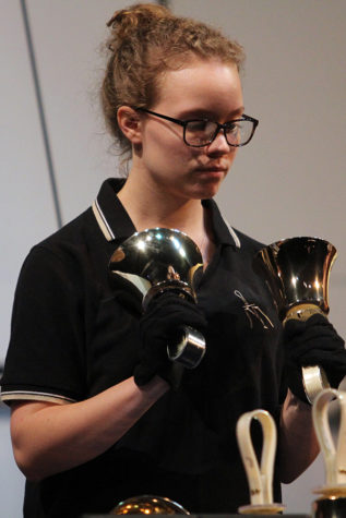 Katie Veronesi (12) plays the bells along with other in her group. Veronesi had been playing bells for seven years. 